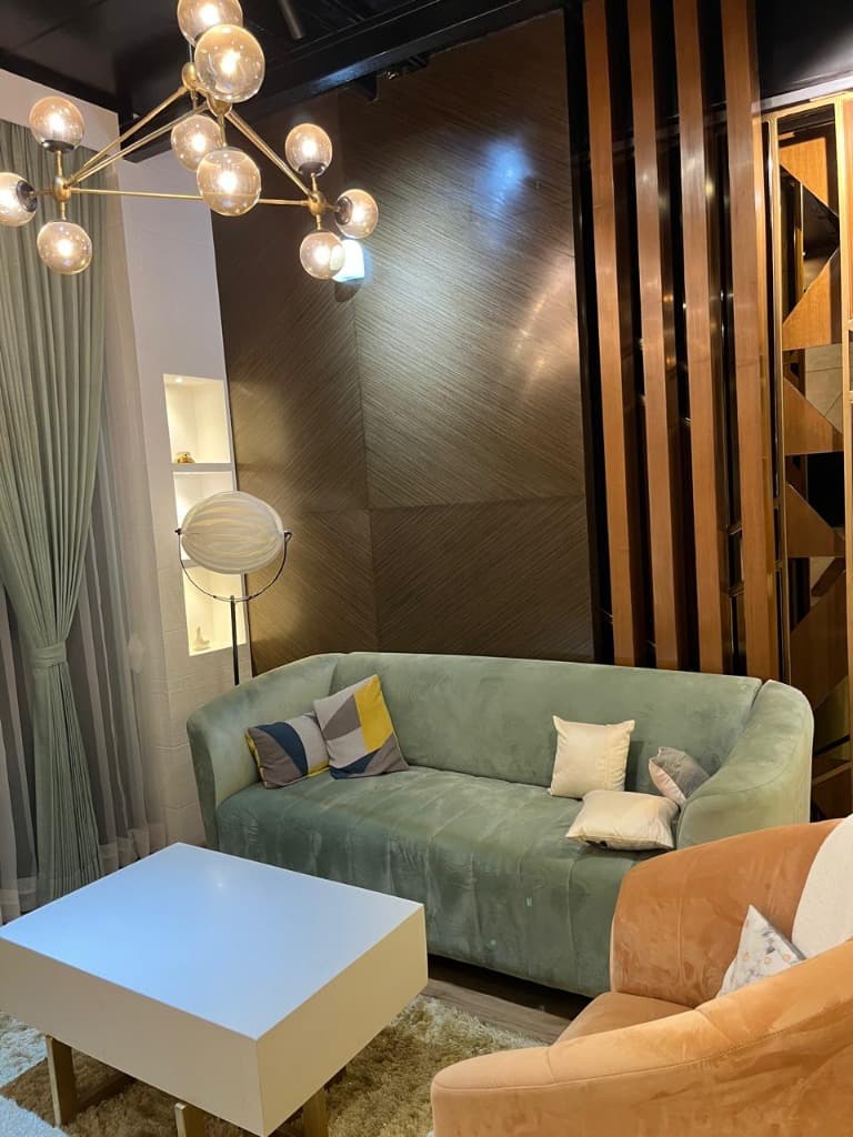 KSM Constructions — Modern Living Room with Statement Lighting